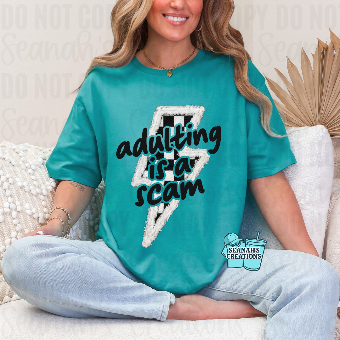 ⚡🖤 Adulting Is a Scam Tee
