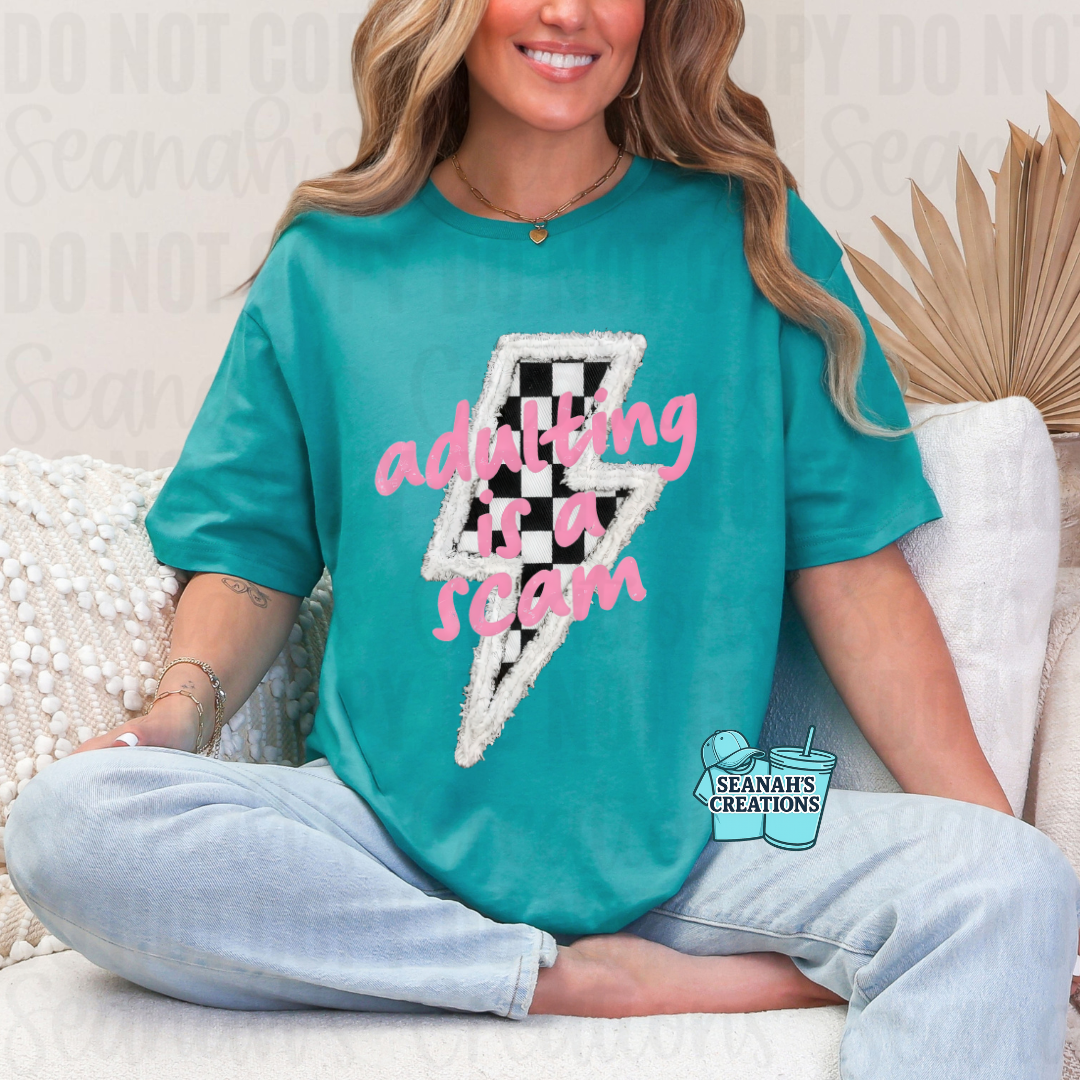 ⚡🖤 Adulting Is a Scam Tee