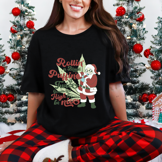 🎅💨 Stoner Santa Tee – “Rollin’ a Blunt, Puffin’ it Twice” 🌿🎄